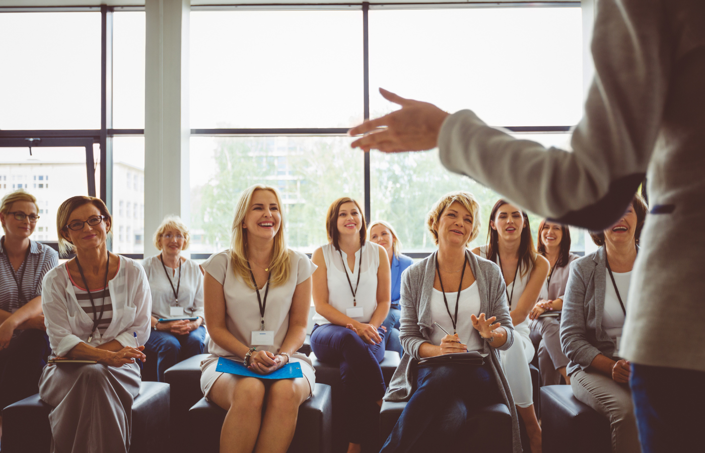 A group of women listening to a speaker